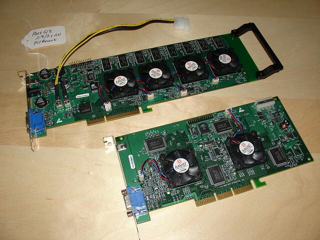 3dfx Voodoo5 5000 AGP x4 32MB Rev.A0 3700 & 3dfx Voodoo5 6000 AGP x2 128MB Rev.A 3700 Top foreward angle