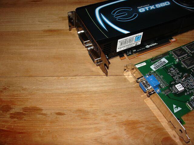3dfx Voodoo3 1000C AGP 16MB Rev.A0 3599 & EVGA GeForce GTX 580 SCE PCI-E 1536MB 384Bit GDDR5 Rev.A1 4910 headshot